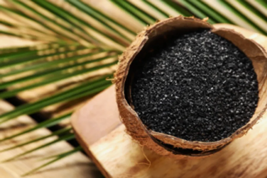 Granular coconut shell activated carbon in a coconut shell bowl